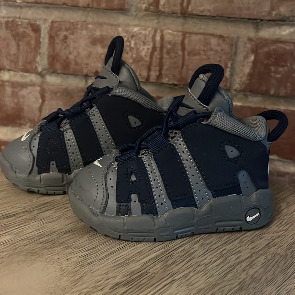 Nike Blue and Gray Sneakers with Durable Construction